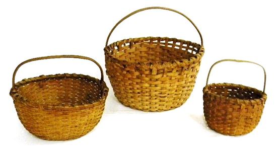 Appraisal: Three splint baskets arched handles smallest '' dia largest ''