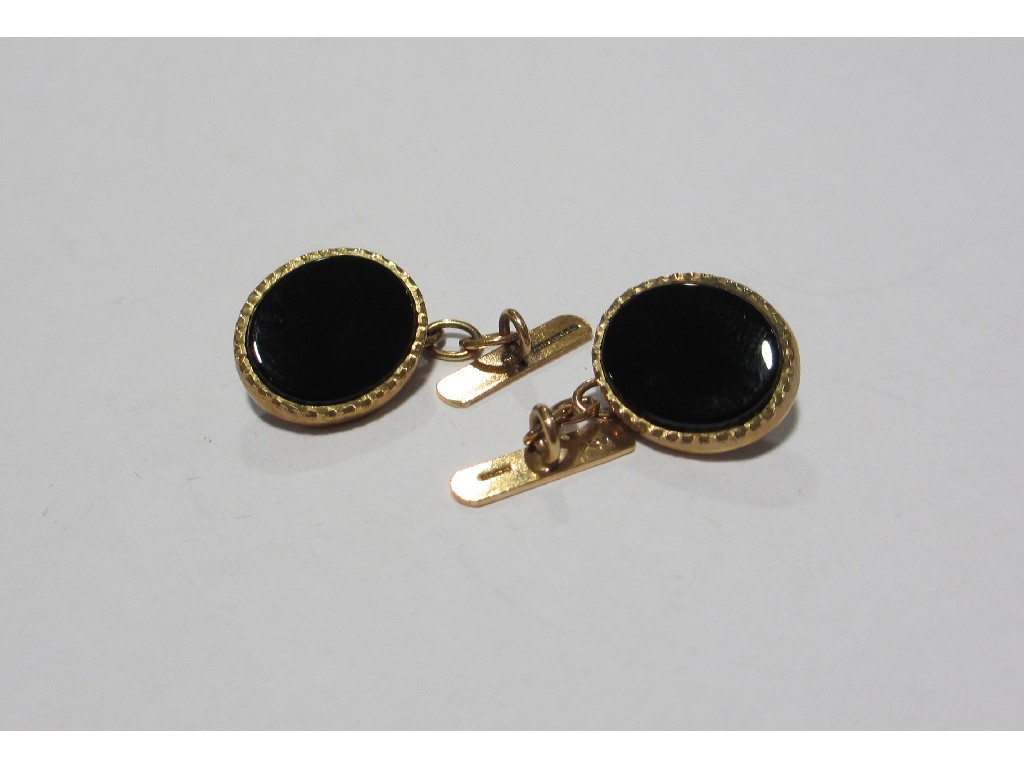 Appraisal: Nine carat gold and onyx cuff links