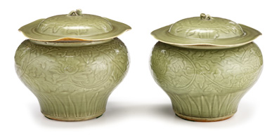 Appraisal: Pair of large Chinese carved celadon glazed porcelain covered jars