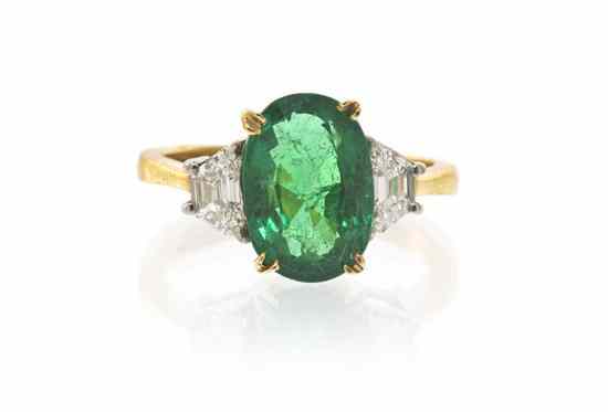 Appraisal: A Platinun Karat Yellow Gold Emerald and Diamond Ring containing