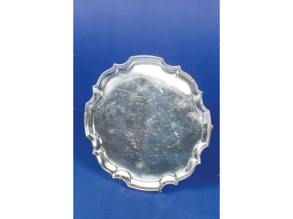 Appraisal: A SALVER of shaped circular form with a raised reeded