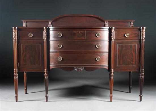 Appraisal: Potthast Bros Federal style carved and inlaid mahogany shaped-front sideboard