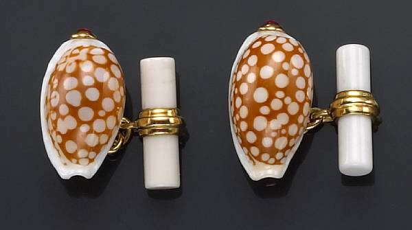 Appraisal: Pair of Cowrie Shell and Ruby Cufflinks By Antora Designed