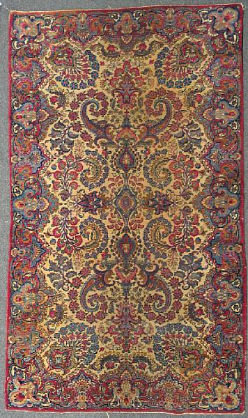 Appraisal: A Kerman rug size approximately ft x ft in