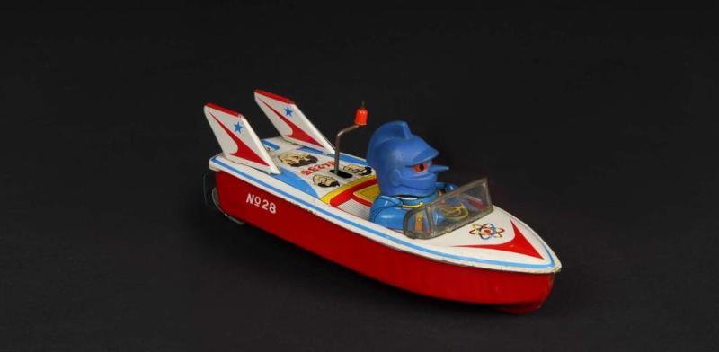 Appraisal: Tin Superhero Tetsujin Boat Friction Toy Description Japanese Marked Asakusa