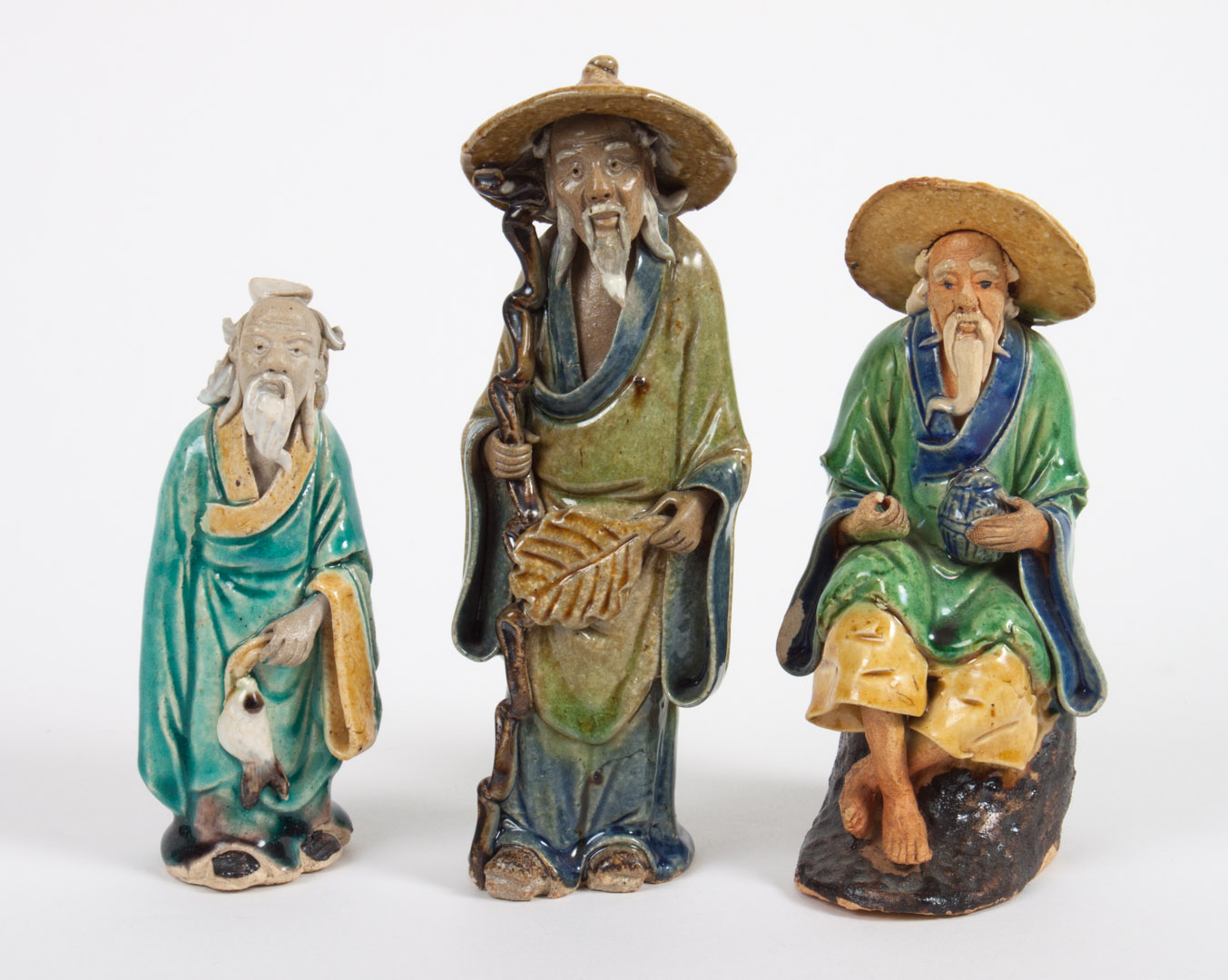 Appraisal: Three Chinese Export glazed terracotta figures first quarter- th century