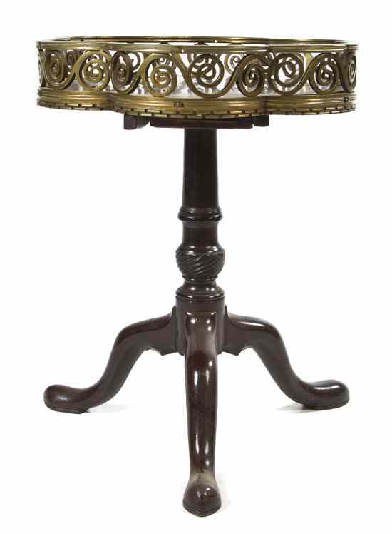 Appraisal: A Gilt Bronze Mounted Tilt Top Occasional Table having a