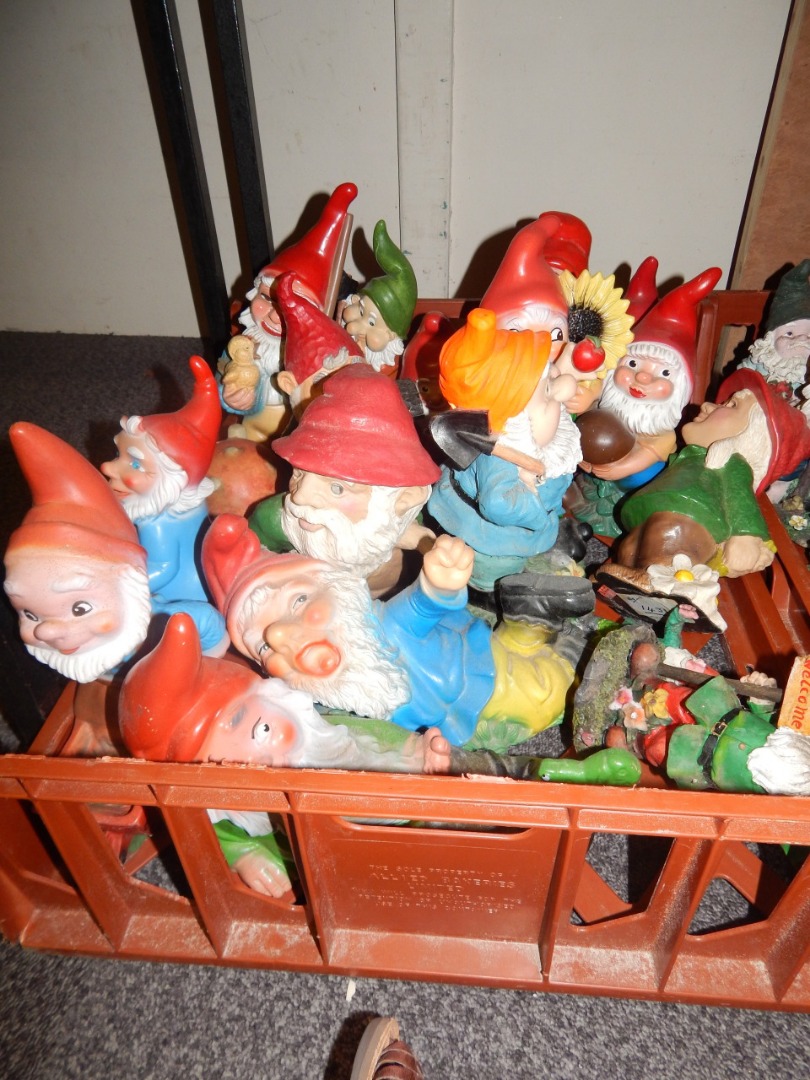 Appraisal: A large quantity of plastic garden gnomes mainly with red