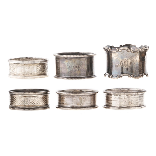 Appraisal: Four and a pair of silver napkin rings the pair