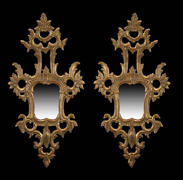 Appraisal: A near pair of Venetian Neoclassical style giltwood mirrors mid