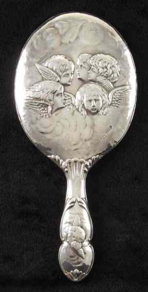 Appraisal: English Sterling Silver Hand Mirror Chester beautifully engraved images of