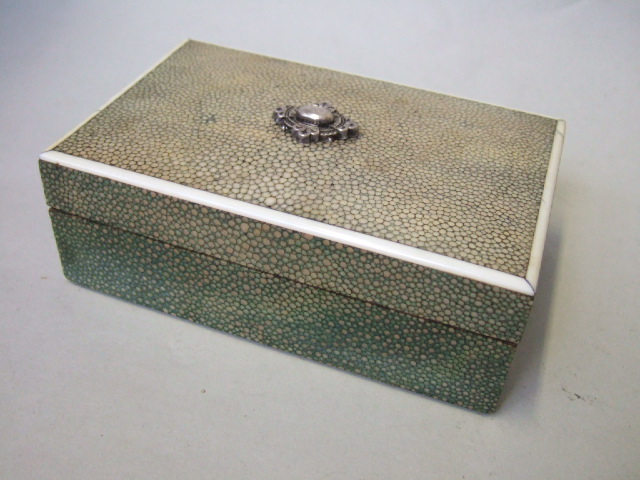 Appraisal: An Asprey shagreen and ivory strung cigarette box with silver