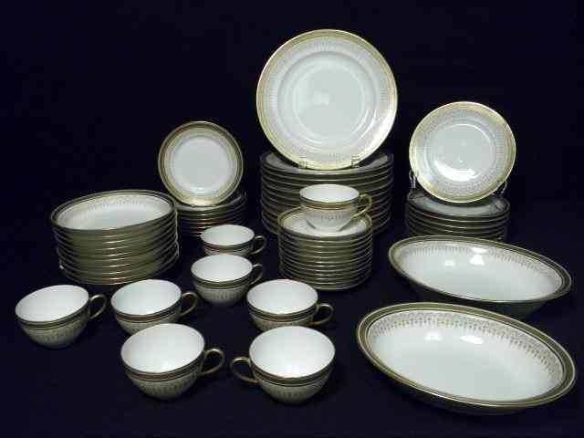 Appraisal: L Bernardaud Co porcelain dinnerware set total pieces France Gilt