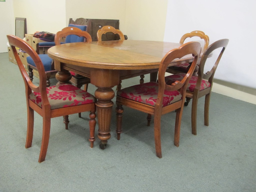 Appraisal: Victorian mahogany oval telescope table with six Victorian chairs