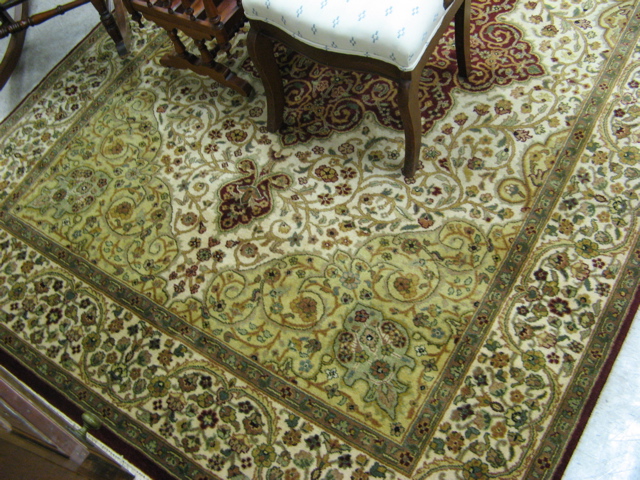 Appraisal: HAND KNOTTED ORIENTAL CARPET Indo-Persian overall scrolling floral raceme decoration