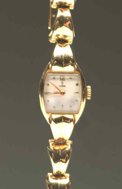 Appraisal: A LADIES CT GOLD WRIST WATCH with square silver dial