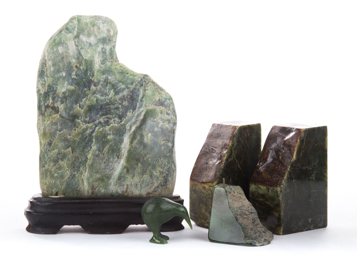 Appraisal: Four pieces of carved oriental jade comprising small scholar's mountain