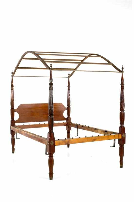 Appraisal: Federal mahogany carved bedstead circa acanthus carved and fluted posts