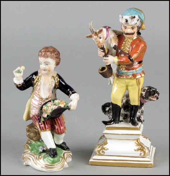 Appraisal: TWO CONTINENTAL GILT AND PAINTED PORCELAIN FIGURES Comprised of a