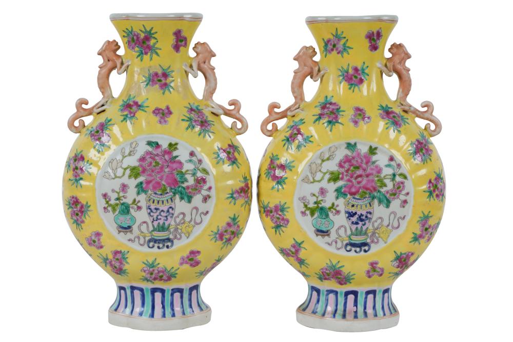 Appraisal: PAIR OF CHINESE YELLOW-GROUND PORCELAIN PILGRIM JARSeach with six-character mark