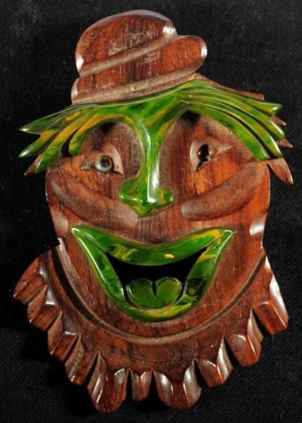 Appraisal: Bakelite Wood Clown Pin Description Open mouth One of glass