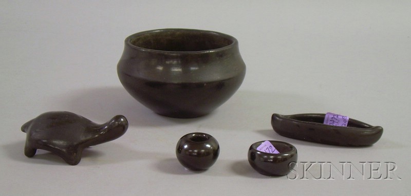 Appraisal: Five Black Glazed Pottery Items two small bowls one signed