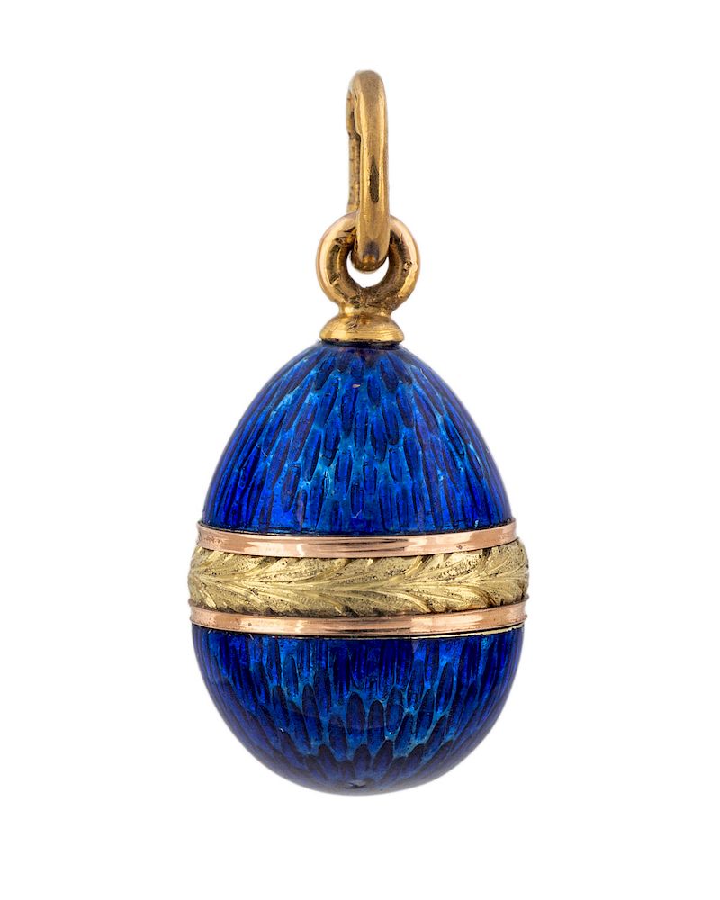 Appraisal: A RUSSIAN GOLD AND GUILLOCHE ENAMEL EGG PENDANT WORKMASTER AUGUST