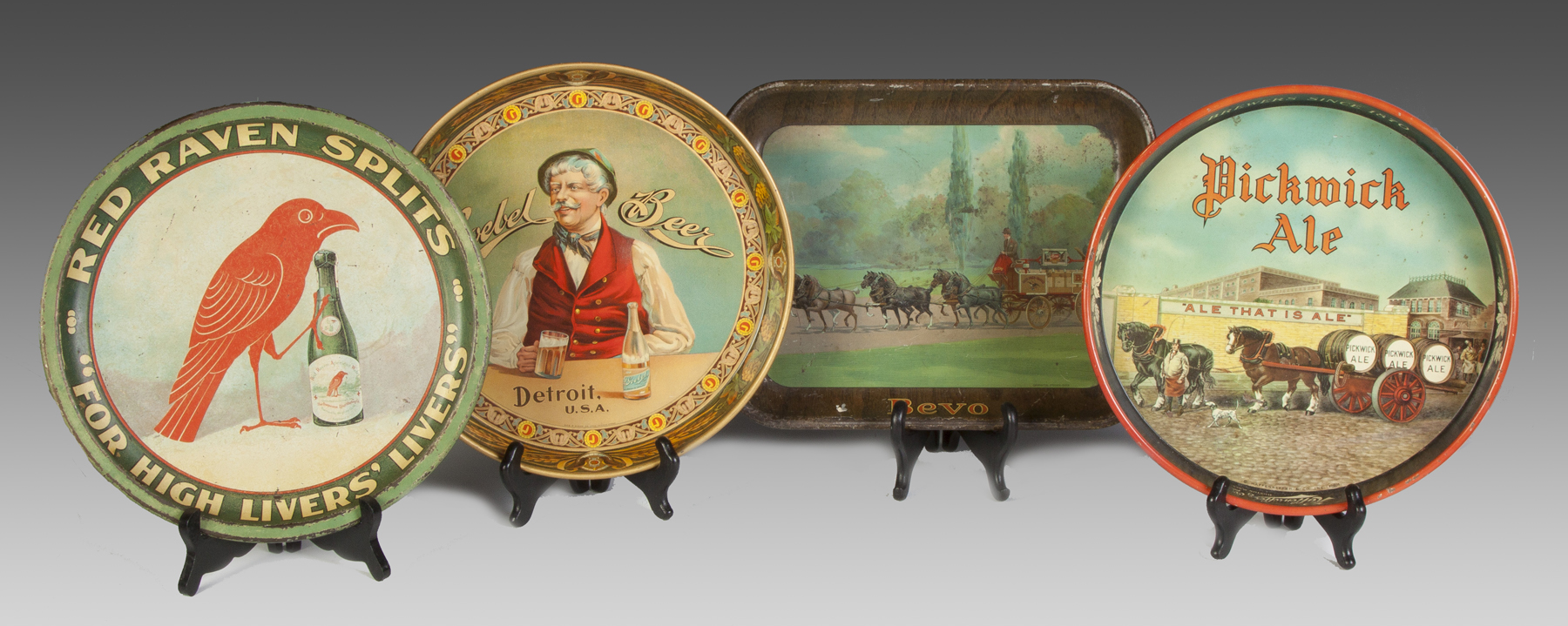 Appraisal: Four Vintage Tin Beer Trays Red Raven Splits Goebel Beer