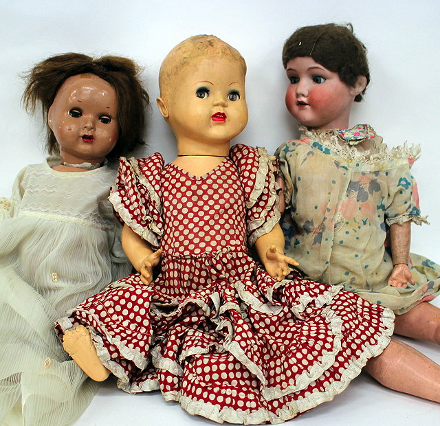 Appraisal: AN ARMOUR MARCIE BISQUE HEADED DOLL size together with a