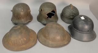 Appraisal: Group of six military helmets to include French model with