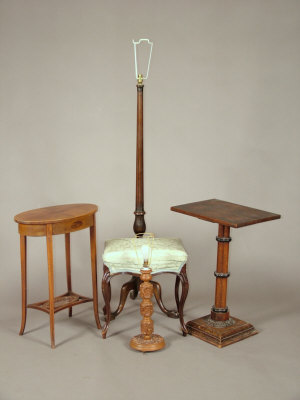 Appraisal: An Edwardian mahogany oval two tier side table the hinged