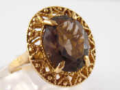 Appraisal: A yellow metal tests carat gold smoky quartz ring quartz