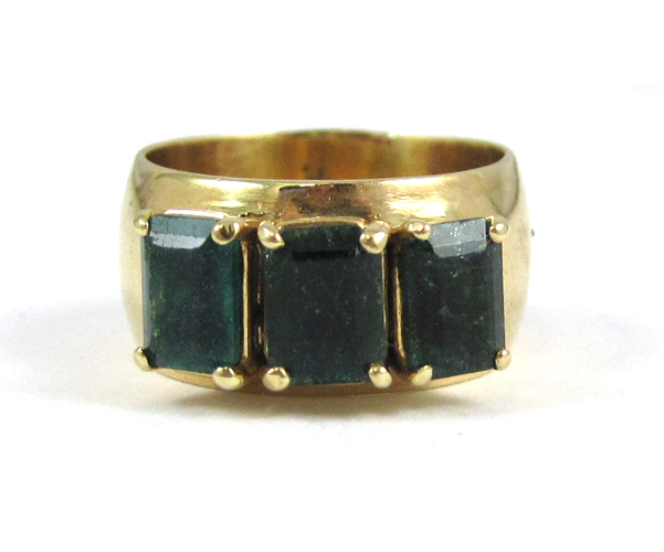 Appraisal: EMERALD AND FOURTEEN KARAT GOLD RING set with three emerald-cut