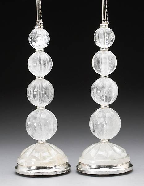 Appraisal: Each composed of four graduated fluted spheres on a domed