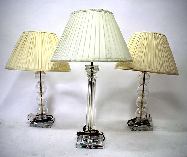 Appraisal: A MODERN GLASS TABLE LAMP of Corinthian column form approximately