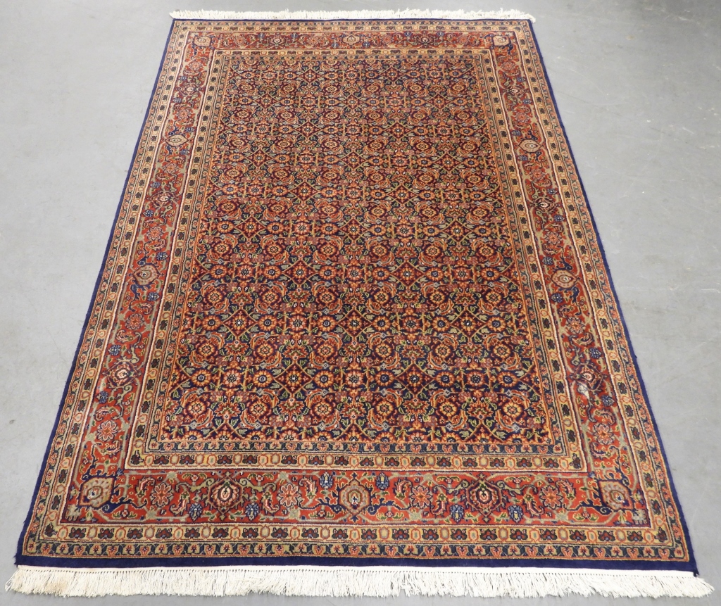 Appraisal: MIDDLE EASTERN GEOMETRIC FLORAL RUG Middle East th CenturyNavy blue