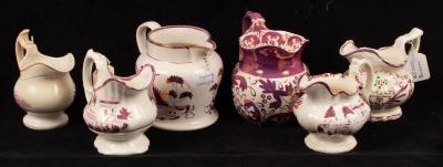 Appraisal: Six pink lustre jugs with various decoration th Century the