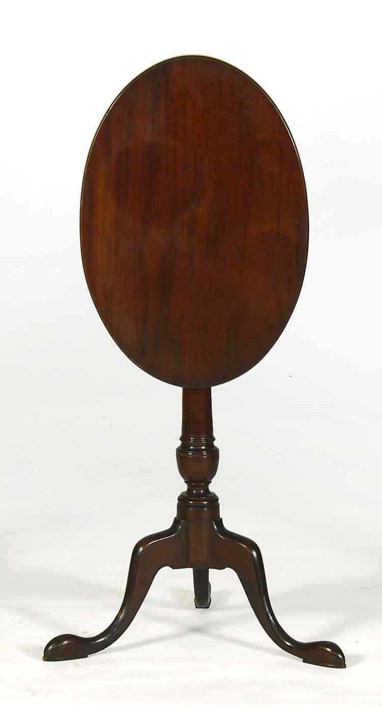 Appraisal: ANTIQUE AMERICAN QUEEN ANNE TILT-TOP CANDLESTANDCirca In mahogany with oval