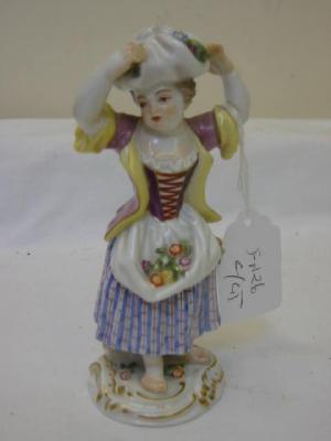 Appraisal: A MEISSEN PORCELAIN FIGURE of a girl wearing a lilac