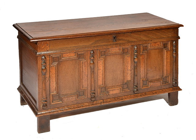 Appraisal: A VICTORIAN OAK SHORT COFFER with three panel carved decorated