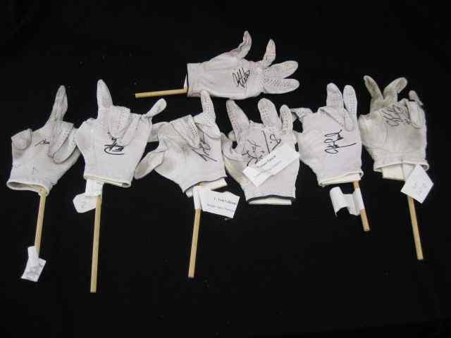 Appraisal: Collection of Autographed Golf Gloves includes Tom Lehman Charles Howell