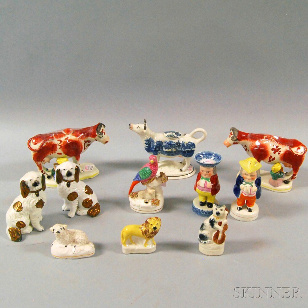 Appraisal: Eleven Staffordshire Ceramic Figures England th century three cow creamers