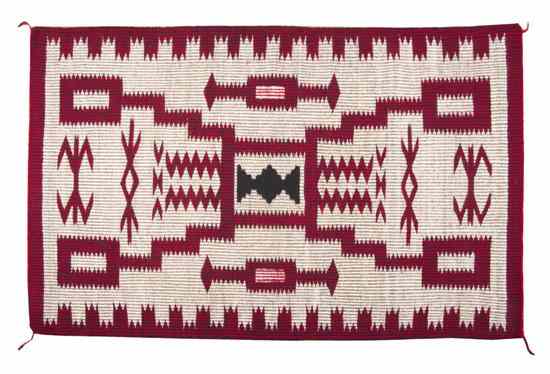 Appraisal: A Navajo Weaving in red black and white weaver Sarah