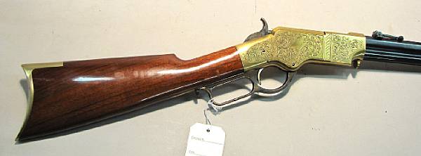 Appraisal: An engraved reproduction Henry Model rifle by Uberti Serial no