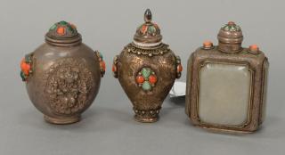 Appraisal: Three Oriental silver snuff bottles one having scrolling leaf design