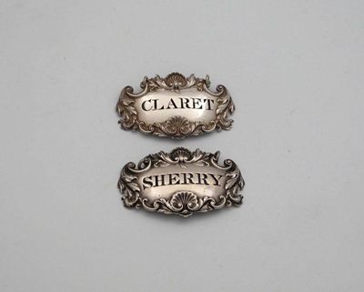 Appraisal: A matched pair of George III IV silver wine labels