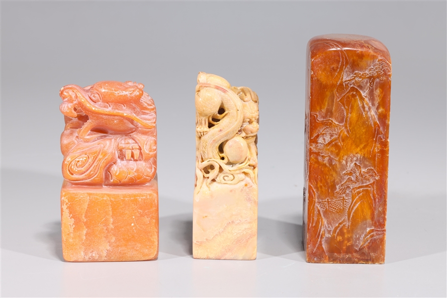 Appraisal: Group of three Chinese carved soapstone seals one with seal