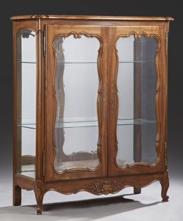 Appraisal: Louis XV Style Carved Walnut Display Cabinet th c the