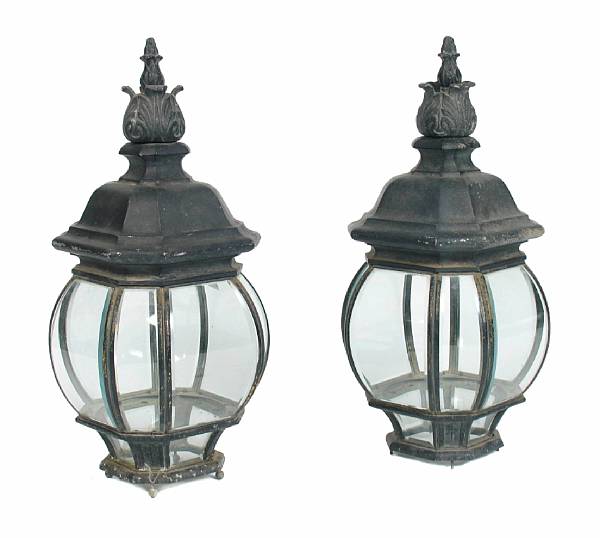 Appraisal: A pair of Neoclassical style patinated metal lamps height in