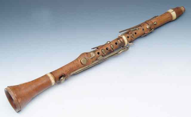 Appraisal: AN ANTIQUE FRUITWOOD CLARINET stamped D' Almaine Co late Goulding